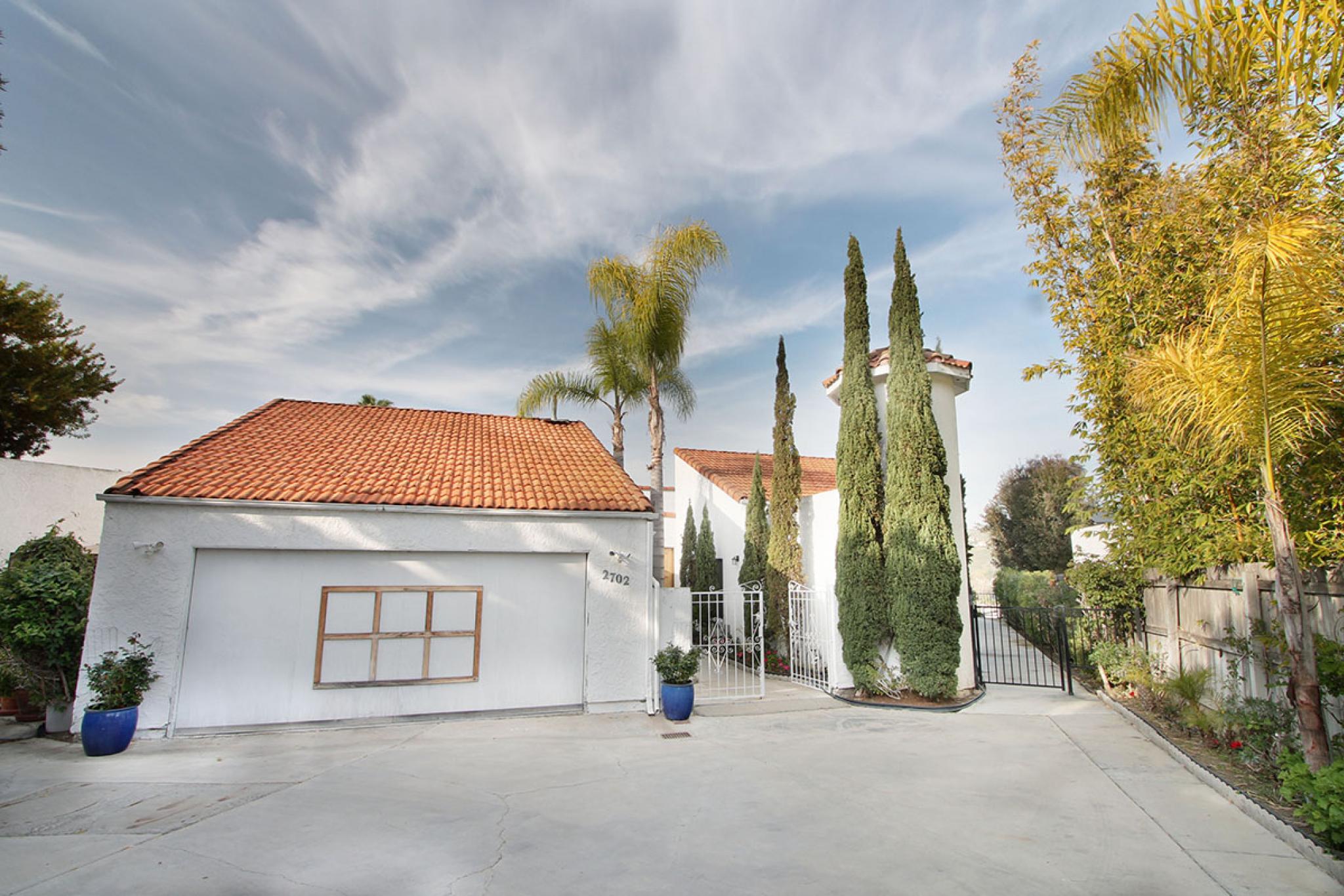 Long driveway leading to a private home for those who value privacy