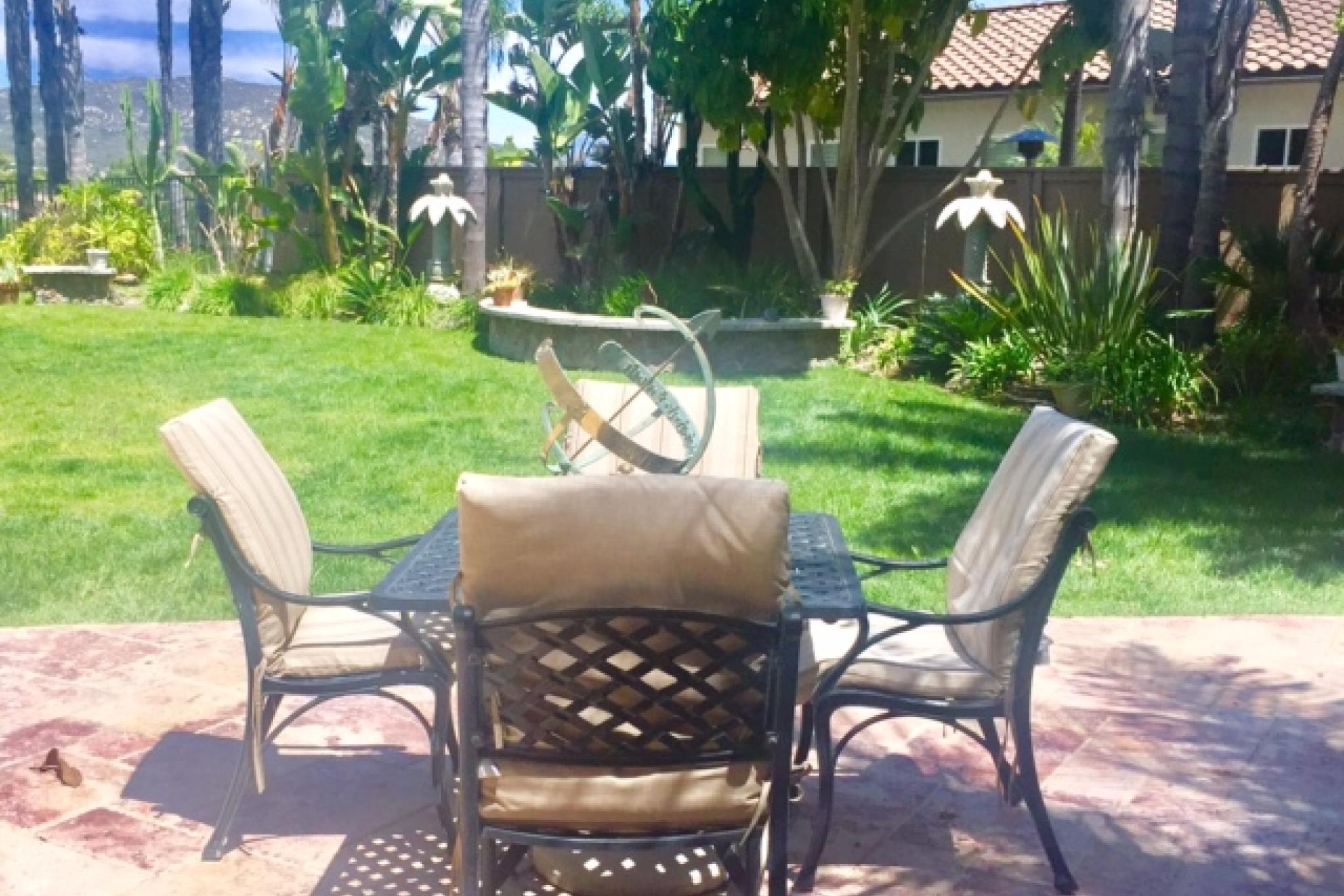 Garden Abode - patio overlooking garden and mountains to the east